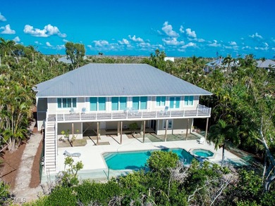 Welcome to 5095 Joewood Drive, a coastal retreat in the