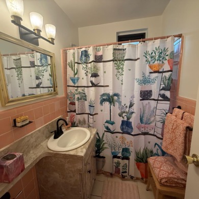 Welcome to this well-kept two-bedroom co-op apartment in the