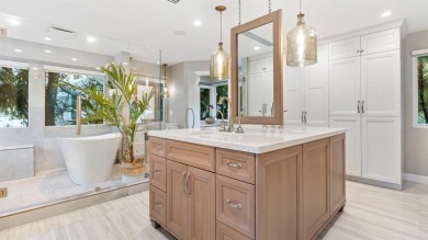 Experience true resort-style living on this rare half-acre