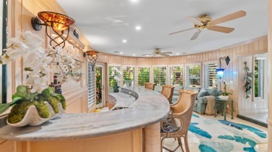 Experience true resort-style living on this rare half-acre