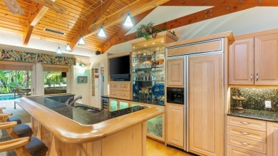 Experience true resort-style living on this rare half-acre