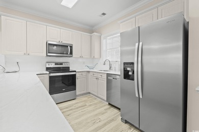 Tucked away in the highly desirable Magnolia Pointe community