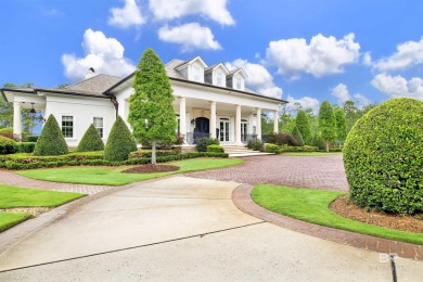 Luxury awaits in this gated Country Club community conveniently