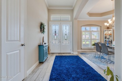 Nestled within the gated Dolphin Bay community, 906 Dolphin