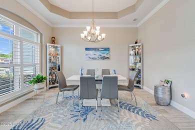 Nestled within the gated Dolphin Bay community, 906 Dolphin