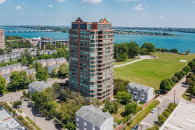 Wake up to sweeping views of the Detroit River and downtown