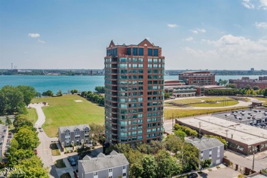 Wake up to sweeping views of the Detroit River and downtown