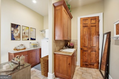 Welcome to 1259 Birch River Drive, a unique masterpiece nestled