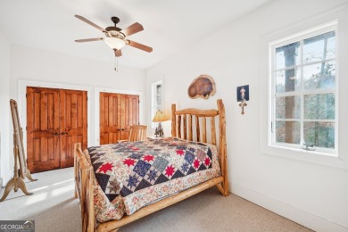 Welcome to 1259 Birch River Drive, a unique masterpiece nestled