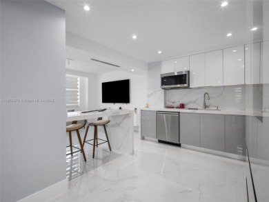 Step into paradise with this fully renovated 2 bedroom, 2 bath