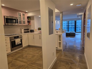 Fully remodeled residence located in a building with direct