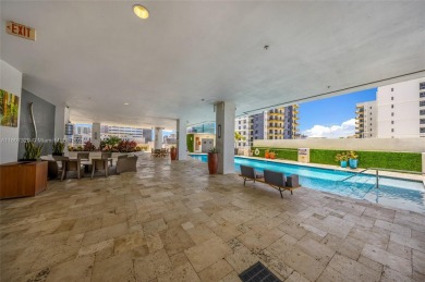 Enjoy the best of Fort Lauderdale living in this bright and