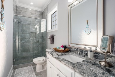 Welcome to 1203 N Ocean Blvd, a stunning 5-bedroom, 5.5-bath