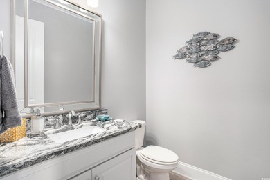 Welcome to 1203 N Ocean Blvd, a stunning 5-bedroom, 5.5-bath