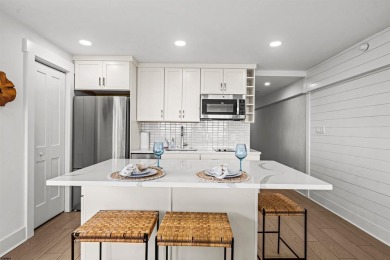 Fall in love with this low-maintenance, completely NEW top floor