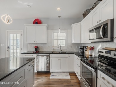 This stunning oceanfront home in North Topsail Beach offers 5