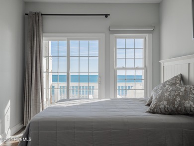 This stunning oceanfront home in North Topsail Beach offers 5