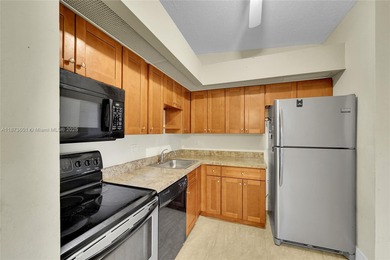 Immaculate 2 bedroom 2 bath, 2nd Floor, a gated 55+ community in