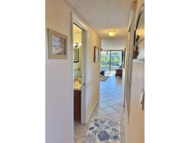 Stunning Bayfront Condo in Moon Bay with Deeded Boat Slip & Boat