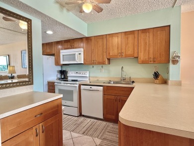 Stunning Bayfront Condo in Moon Bay with Deeded Boat Slip & Boat