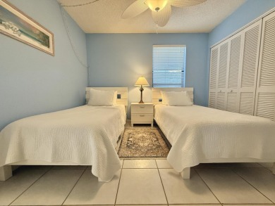 Stunning Bayfront Condo in Moon Bay with Deeded Boat Slip & Boat