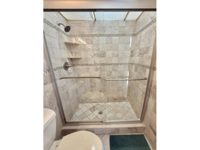 Stunning Bayfront Condo in Moon Bay with Deeded Boat Slip & Boat