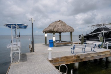 Stunning Bayfront Condo in Moon Bay with Deeded Boat Slip & Boat