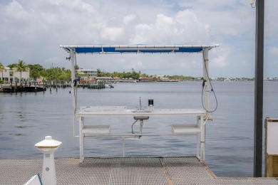 Stunning Bayfront Condo in Moon Bay with Deeded Boat Slip & Boat