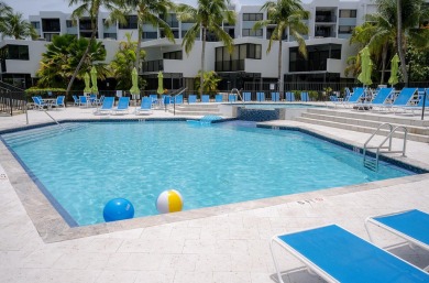 Stunning Bayfront Condo in Moon Bay with Deeded Boat Slip & Boat