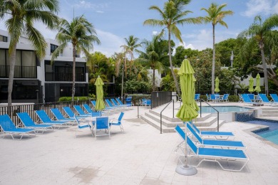 Stunning Bayfront Condo in Moon Bay with Deeded Boat Slip & Boat