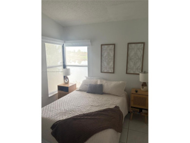 Stunning one-story villa with breathtaking lakefront views! This