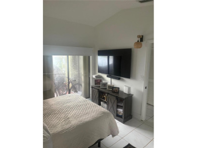 Stunning one-story villa with breathtaking lakefront views! This