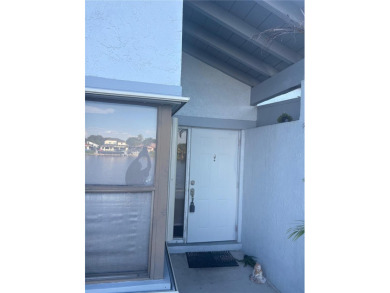 Stunning one-story villa with breathtaking lakefront views! This