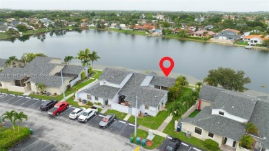 Stunning one-story villa with breathtaking lakefront views! This