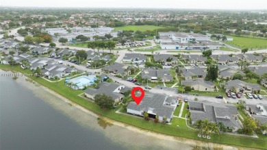 Stunning one-story villa with breathtaking lakefront views! This