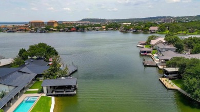 This charming 3 bedroom/2.5 bath home on Lake LBJ is a must see