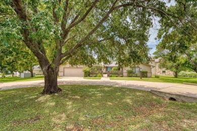 This charming 3 bedroom/2.5 bath home on Lake LBJ is a must see
