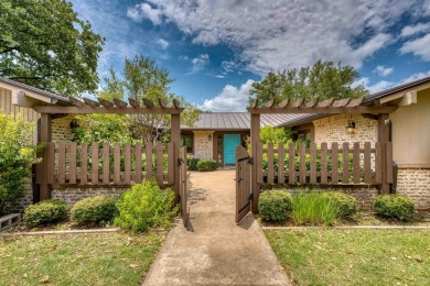 This charming 3 bedroom/2.5 bath home on Lake LBJ is a must see