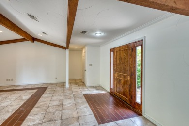 This charming 3 bedroom/2.5 bath home on Lake LBJ is a must see