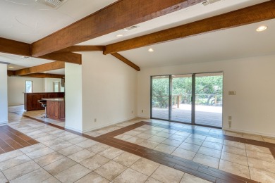 This charming 3 bedroom/2.5 bath home on Lake LBJ is a must see