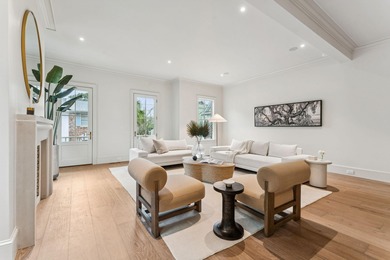 Welcome to 4 Trapman Street -- a beautifully designed townhome