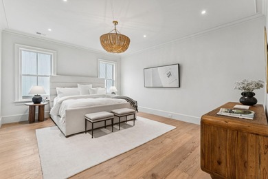 Welcome to 4 Trapman Street -- a beautifully designed townhome