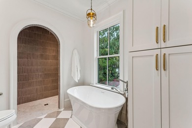 Welcome to 4 Trapman Street -- a beautifully designed townhome