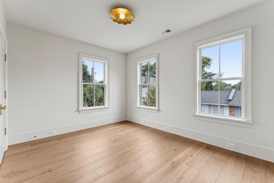 Welcome to 4 Trapman Street -- a beautifully designed townhome