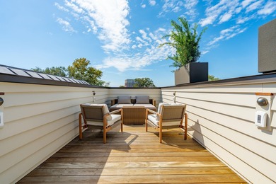 Welcome to 4 Trapman Street -- a beautifully designed townhome