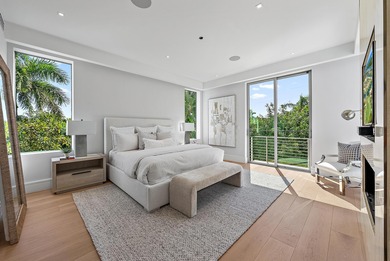 A vision of modern Palm Beach luxury, this brand-new 2025