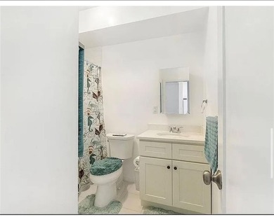 This beautiful, renovated home is a true beach lover's paradise!