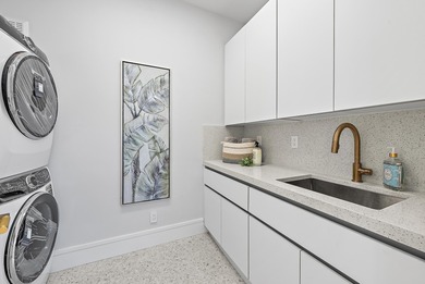 A vision of modern Palm Beach luxury, this brand-new 2025