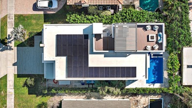 A vision of modern Palm Beach luxury, this brand-new 2025