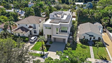 A vision of modern Palm Beach luxury, this brand-new 2025